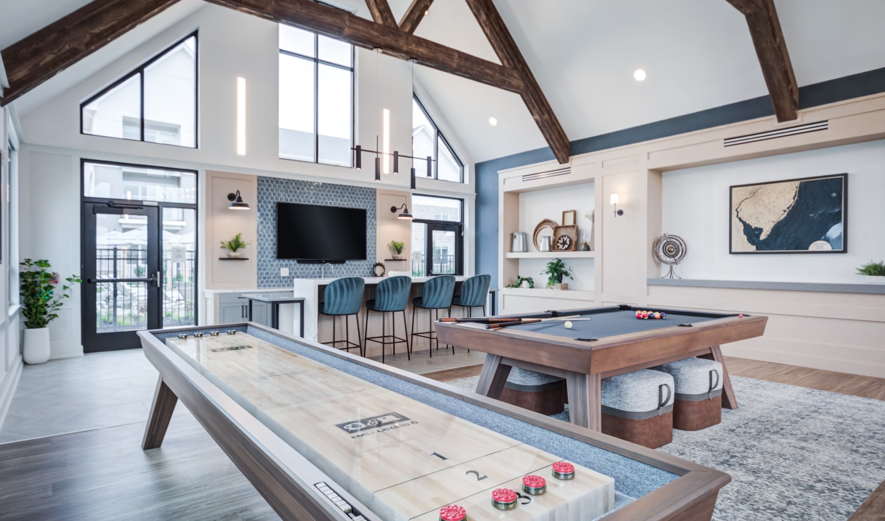 clubhouse billiards and shuffleboard next to entertainment kitchen and seating  J Centra Burlington NJ luxury apartments  clubhouse billiards and shuffleboard next to entertainment kitchen and seating  J Centra Burlington NJ luxury apartments