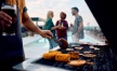 people grilling by the pool J Centra Burlington NJ Luxury Apartments