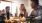 people socializing and sitting at a table with foo J Centra Burlington NJ apts for rent d and drinks 