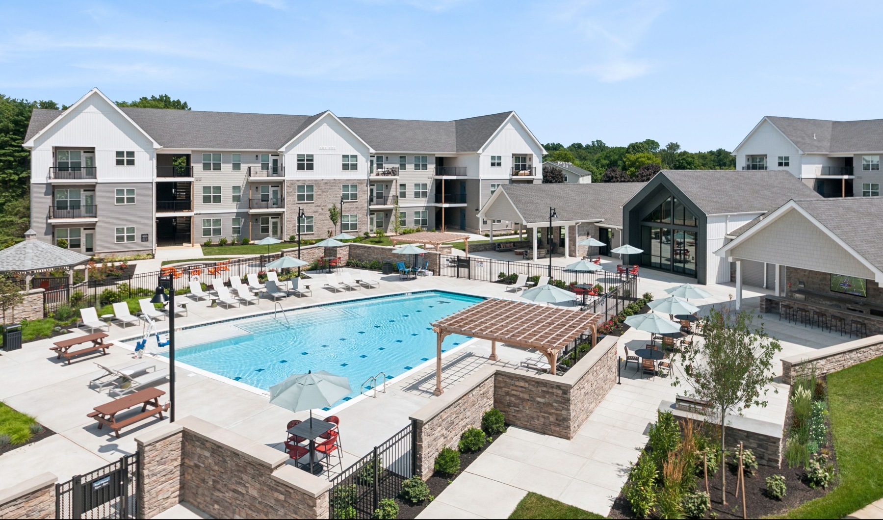 Aerial view of swimming pool with lap lanes J Centra Burlington Township NJ best luxury apartments for rent