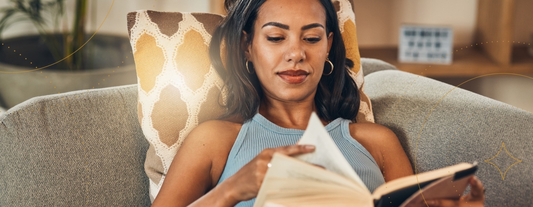 a woman reading a book Mount Holly NJ luxury apartments for rent J Centra Burlington 